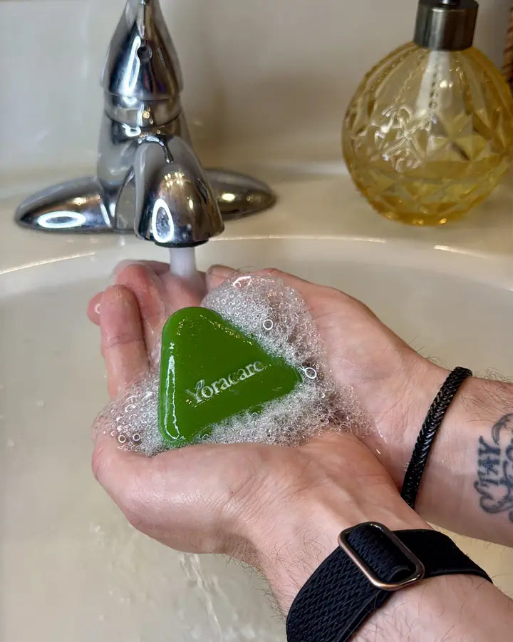 Content creator showing the Yoracare shampoo bar in their bathroom