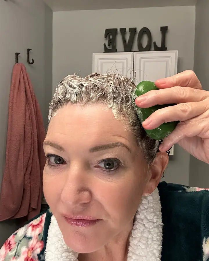 Content creator showing the Yoracare shampoo bar in their bathroom
