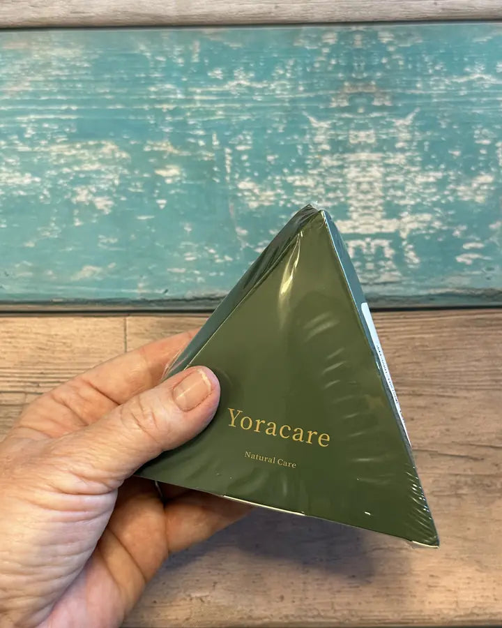 Content creator showing the Yoracare shampoo bar in their bathroom